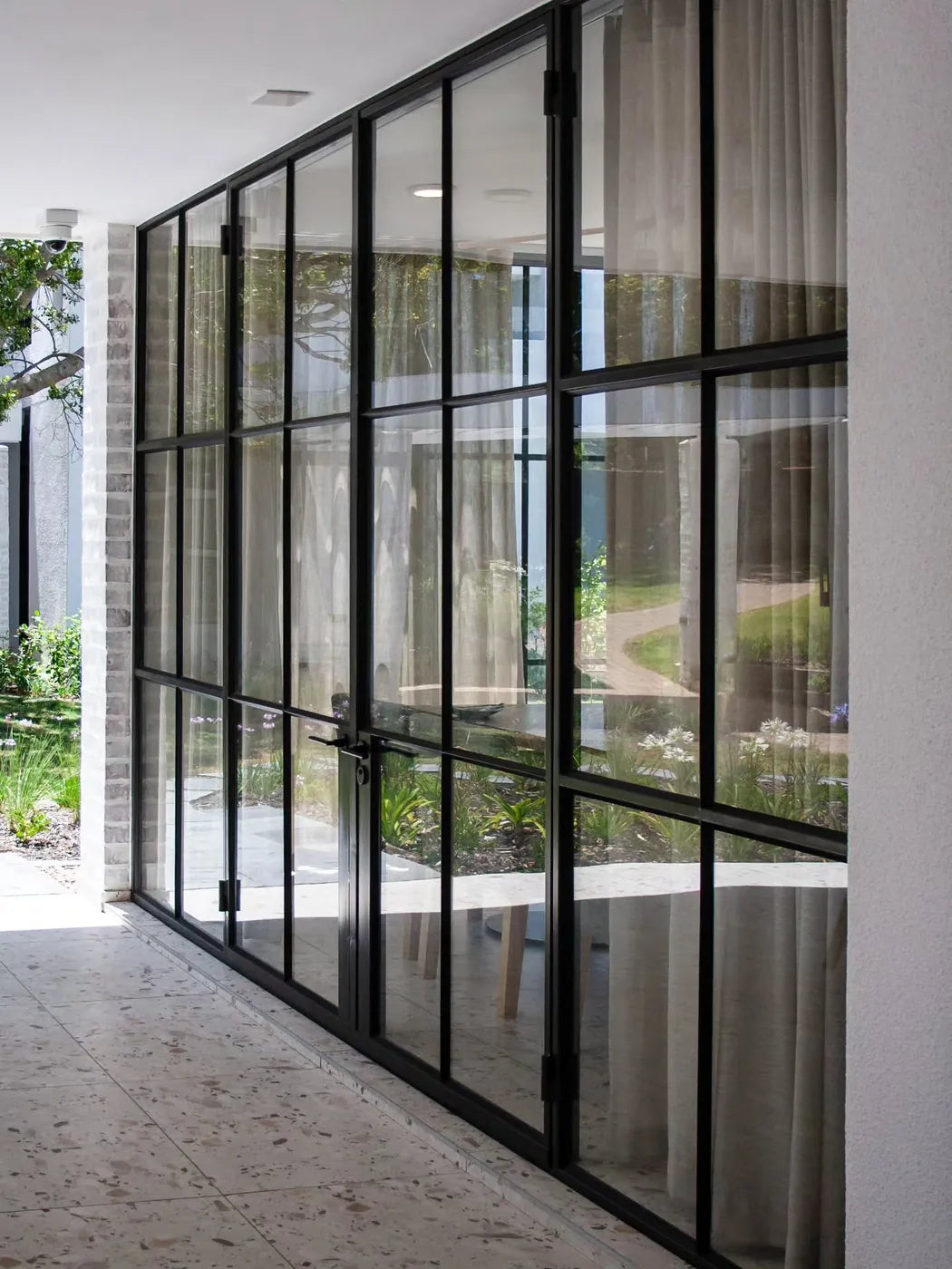 Designed to frame the view.

Our custom steel doors at Oasis Life combine strength, elegance, and timeless style to c...