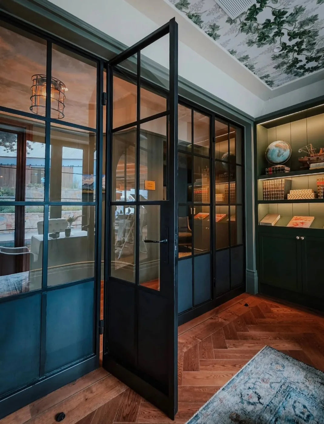 Steel, glass, and quiet detail.

We made these wrought iron doors to frame something special.