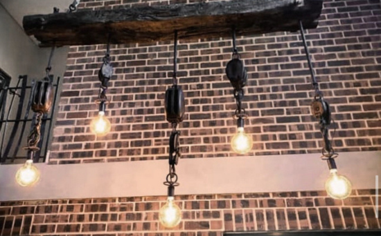 Black wrought iron and wood rustic chandelier