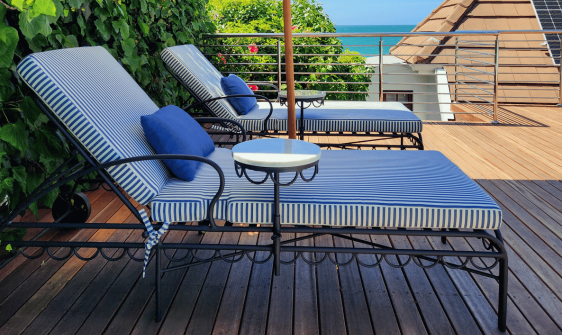 wrought iron loungers on patio