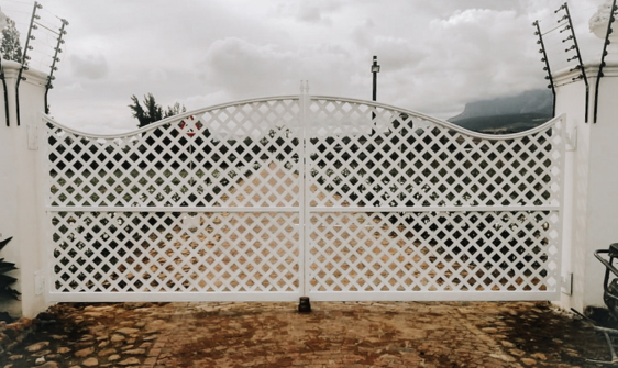 white wrought iron garden gate